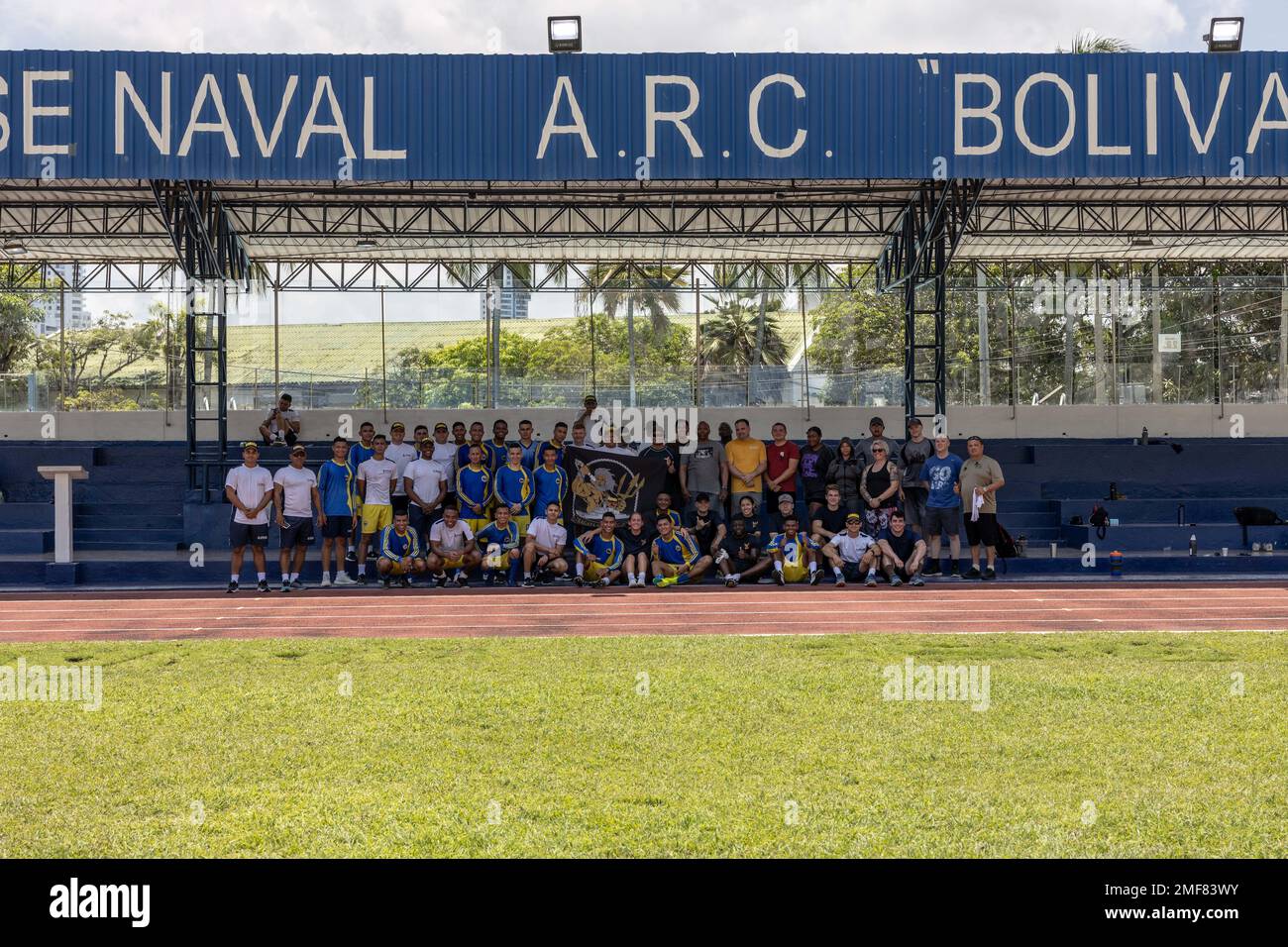 220817-M-JX780-1147  CARTAGENA, Colombia - (Aug. 17, 2022) – Sailors assigned to the Spearhead-class expeditionary fast transport vessel USNS Burlington (T-EPF-10), and Colombian sailors pose for a group photo following a soccer match while the ship is inport Cargenata, Colombia, Aug. 17, 2022.. The soccer match was held to develop camaraderie between the U.S. and Colombian personnel. Burlington is deployed to the U.S. 4th Fleet area of operations to support expeditionary maintenance to deployed littoral combat ships operating in the region and conduct theater security cooperation engagements Stock Photo