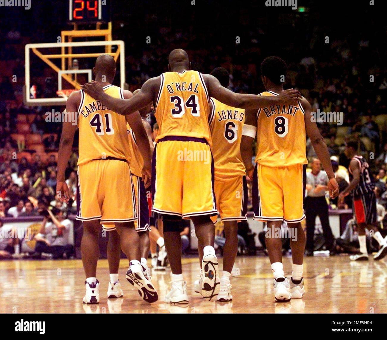 Los Angeles Lakers center Shaquille O'Neal (34) puts his Los Angeles Lakers center Shaquille O'Neal (34) puts his