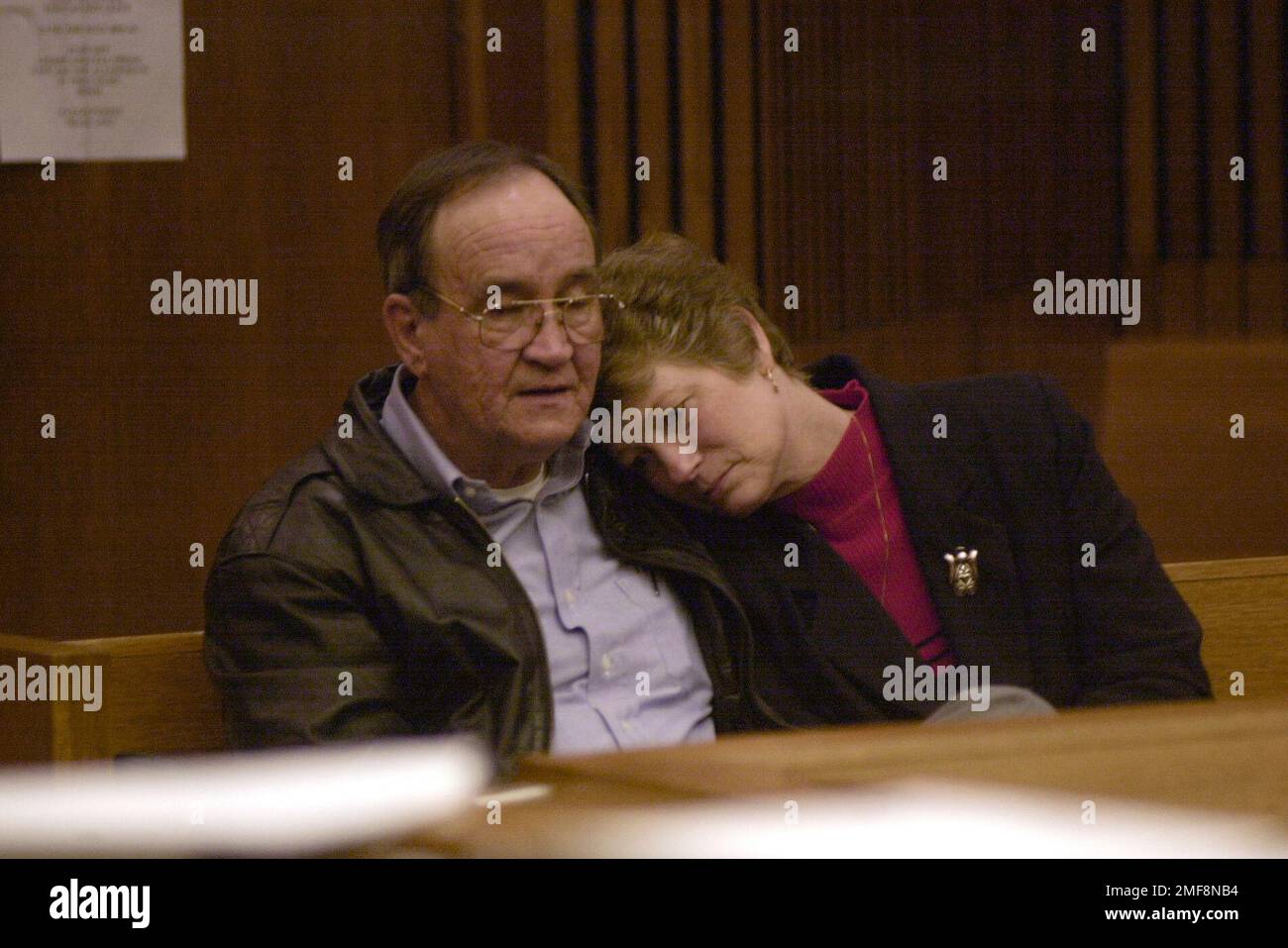 Two people embrace during the trial of accused serial killer John Eric  Armstrong in Detroit, in March 2001. Armstrong, 26, is charged with  first-degree murder in the death of prostitute Wendy Jordan.