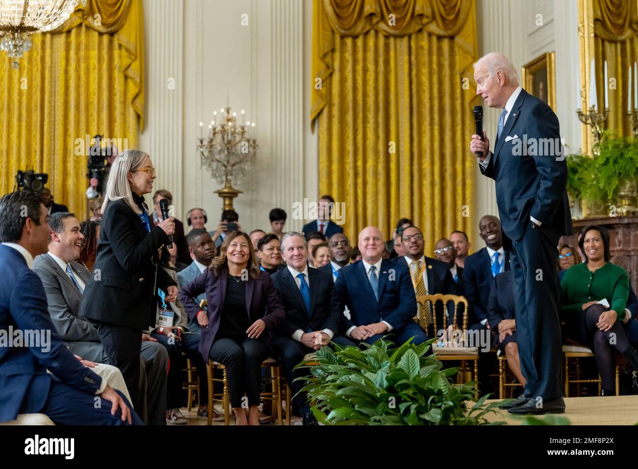 Reportage: President Joe Biden takes a question from Reno, Nevada Mayor Hillary Schieve during an event with bipartisan mayors attending the U.S. Conference of Mayors Winter Meeting, Friday, January 20, 2023, in the East Room of the White House Stock Photo