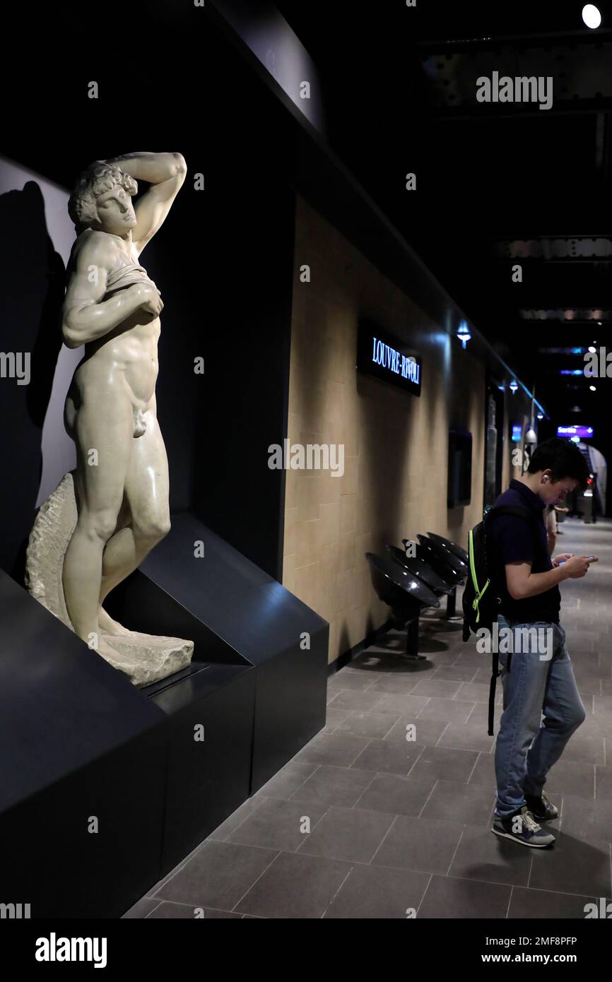The reproduction of the statue of Michelangelo's the Dying Slave decorating the Metro station platform of Louvre-Rivoli in Paris.France Stock Photo