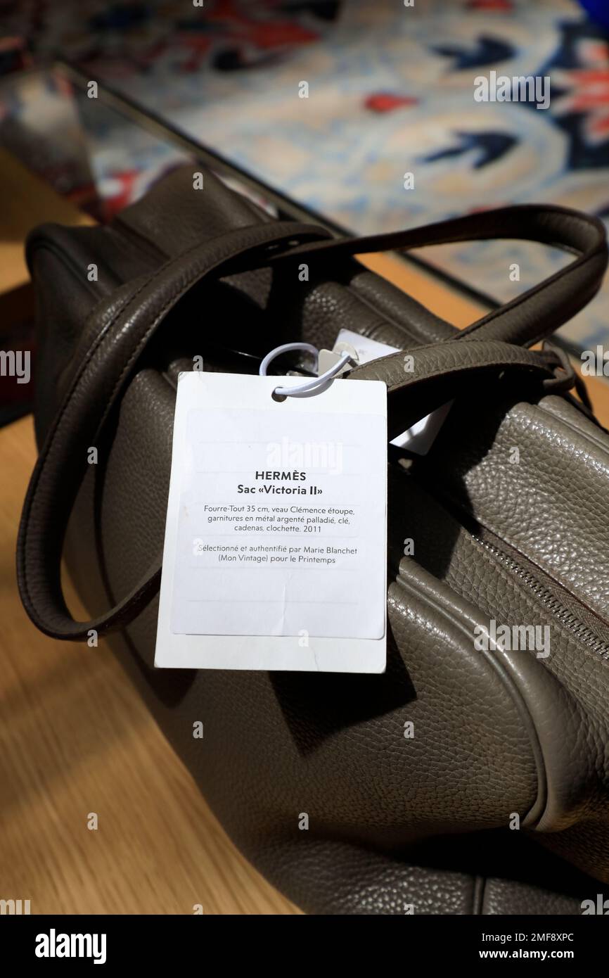 A vintage Hermes handbag with Second 2 Printemps tag for sale in 2e Printemps (Second Printemps) store at 7ieme Ciel (Seventh Heaven) in the 7th floor of Au Printemps department store.Paris.France Stock Photo