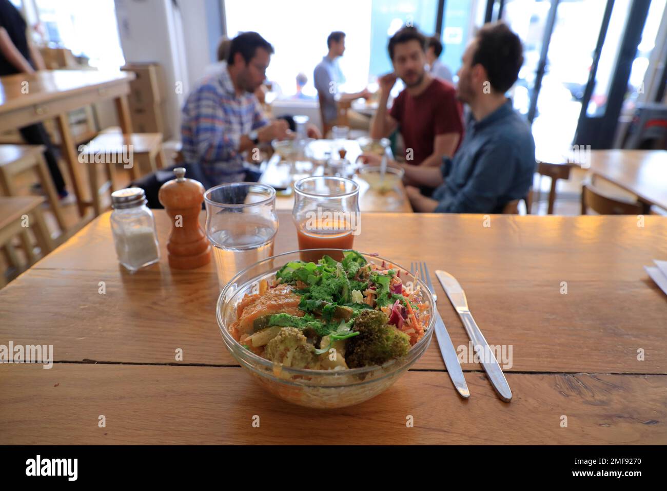 A bowl of salmon with vegetable served in Le Bichat, a eco-friendly and vegetarian friendly restaurant serving organic and farm to table food and drinks in 10th arrondissement of Paris.France Stock Photo