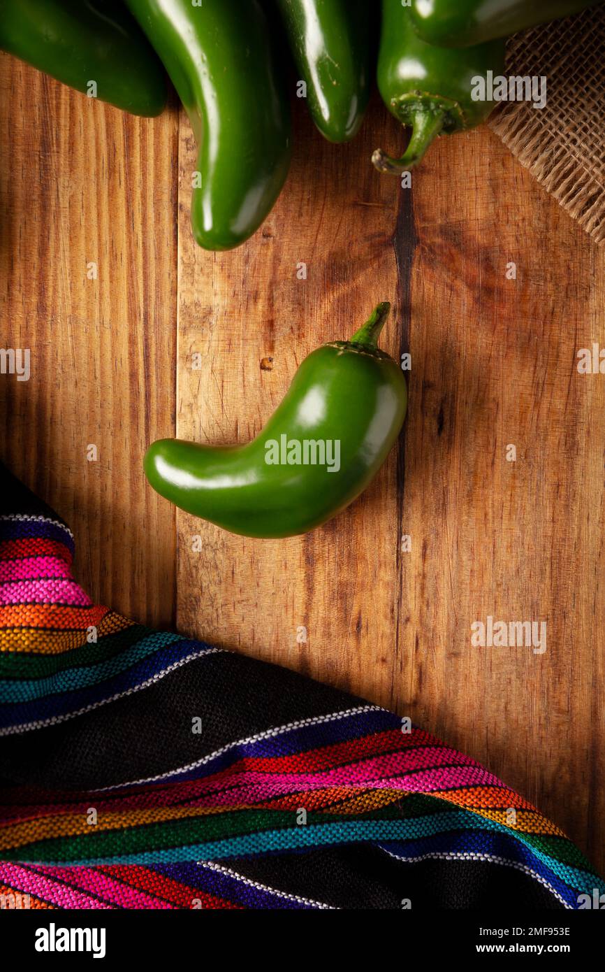 Serrano Chile or Green Chile. (Capsicum annum). Very popular variety of hot chili in Mexican cuisine, it is commonly consumed fresh in a wide variety Stock Photo