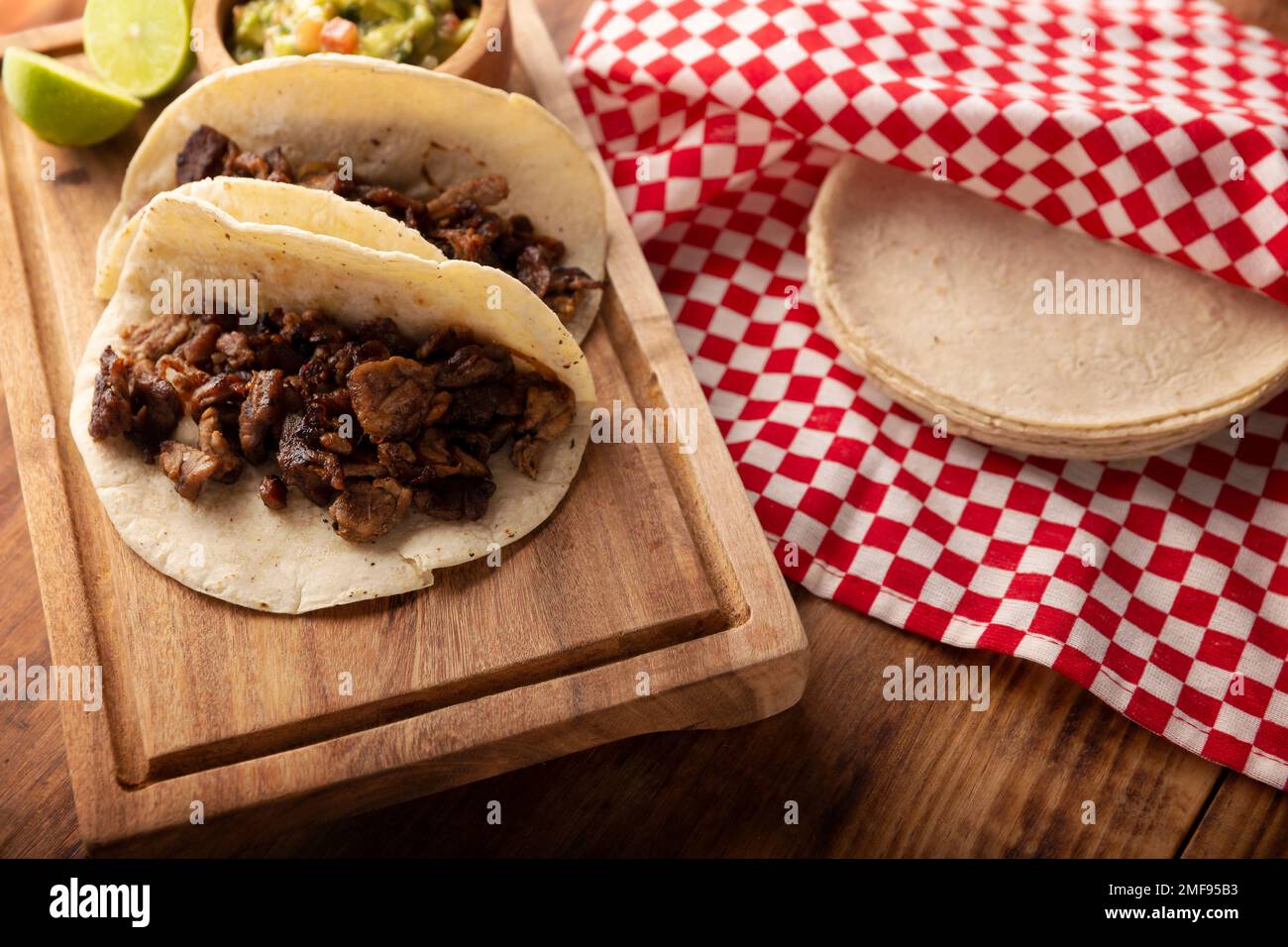 Tacos de Bistec. Homemade grilled meat in a corn tortilla. Street food