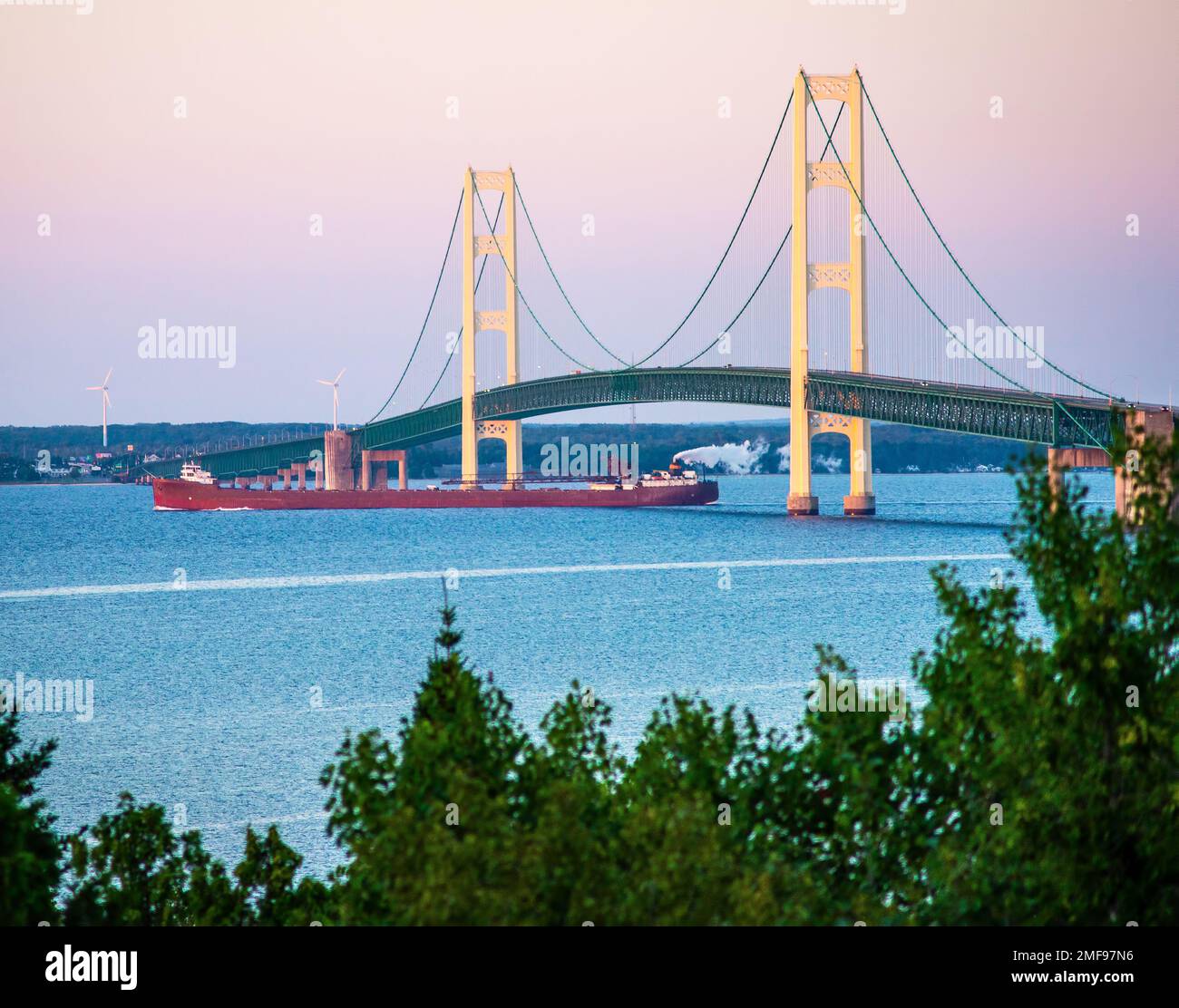 Mac Bridge view from St.Ignace state park at sunrise with Ship Stock