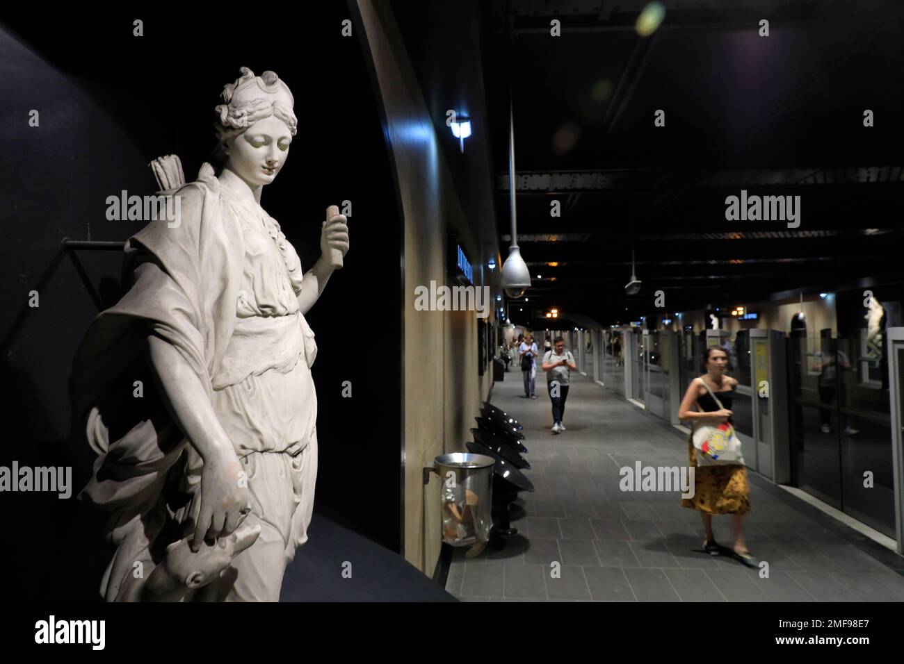 Replica of ancient statue from Louvre Museum display in Louvre-Rivoli metro station.Paris.France Stock Photo