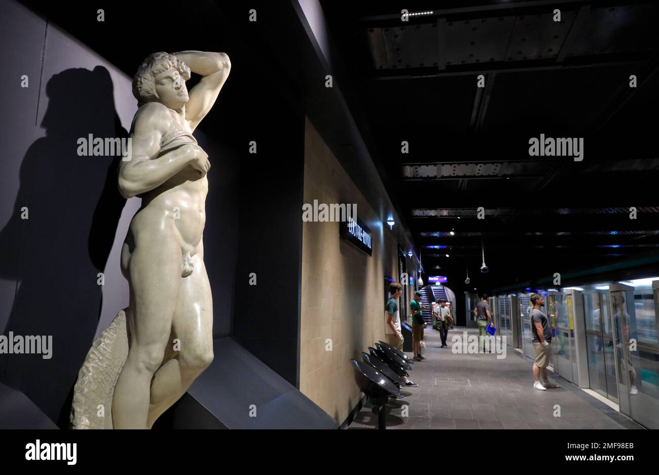 The replica of Michelangelo's the Dying Slave display in Louvre-Rivoli metro station.Paris.France Stock Photo