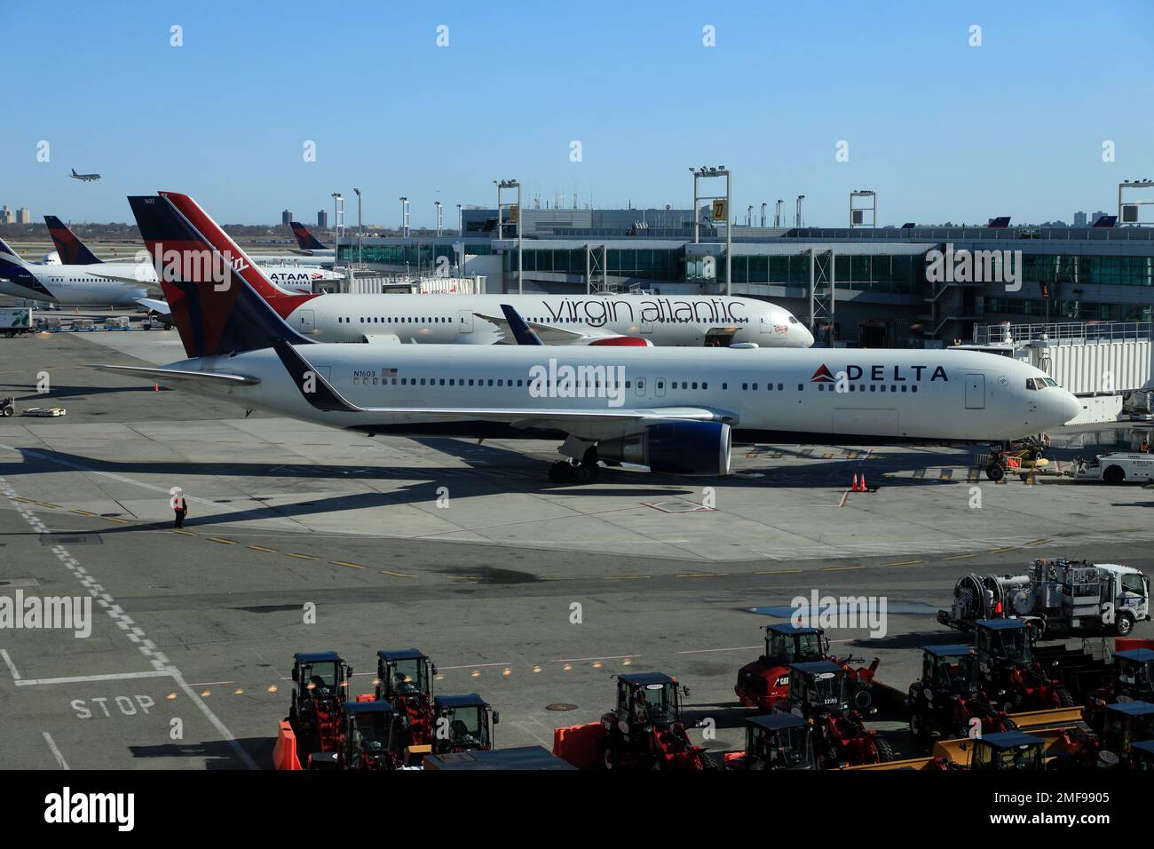 Delta air lines passenger airliners on the tarmac of delta terminal in