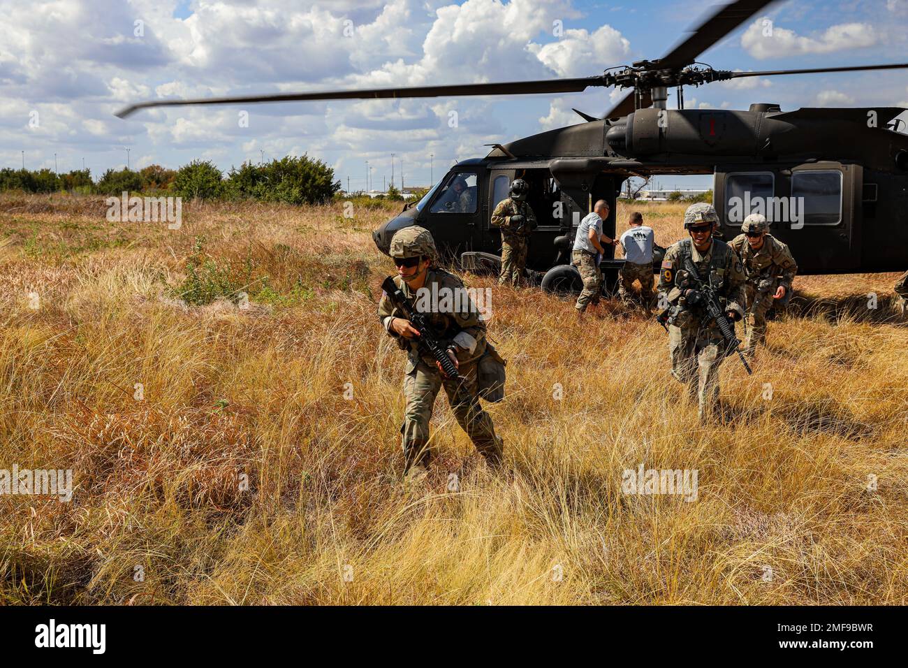 U.S. Army Soldiers with the 9th Squadron Blue Platoon run from UH-60 ...