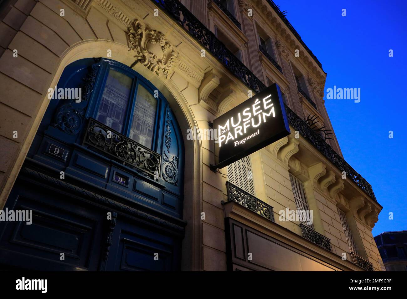 The night view of the sign of Musee du Parfum Fragonard over the entrance.Paris.France Stock Photo