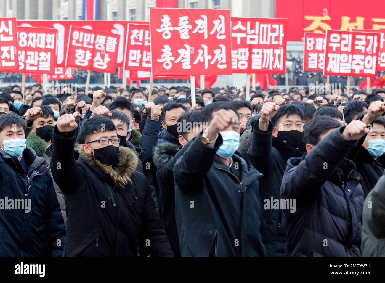 In a mass rally the Pyongyang city army-people celebrate the election ...
