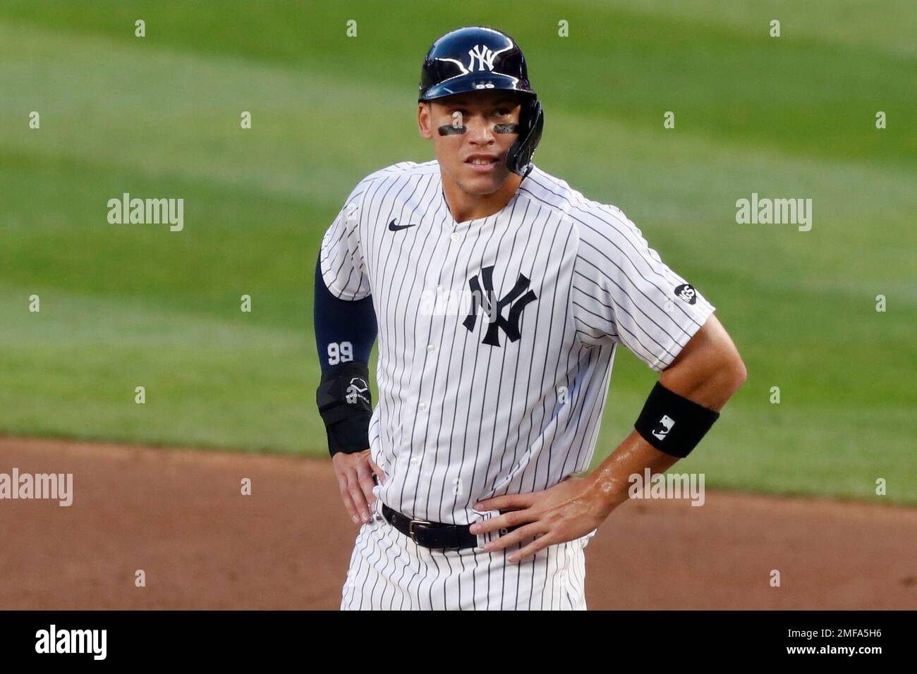 FILE - New York Yankees right fielder Aaron Judge (99) stands on