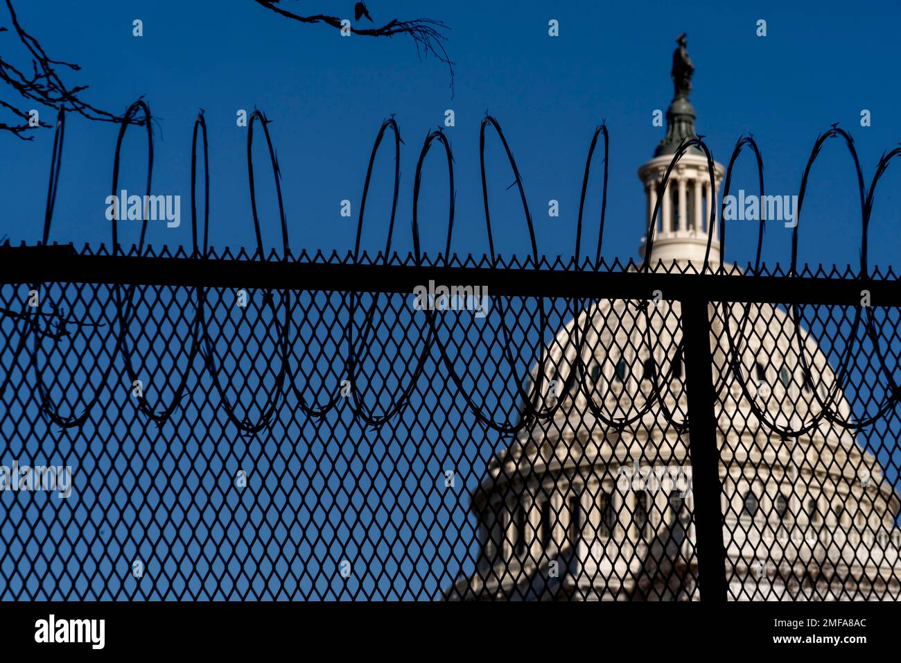 Capital Building Razor Wire The Dome of the Capitol Building is visible through razor wire ...
