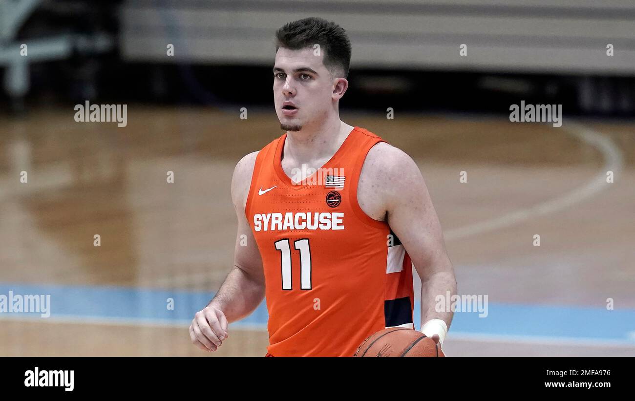 Syracuse guard Joseph Girard III (11) dribbles during the second half