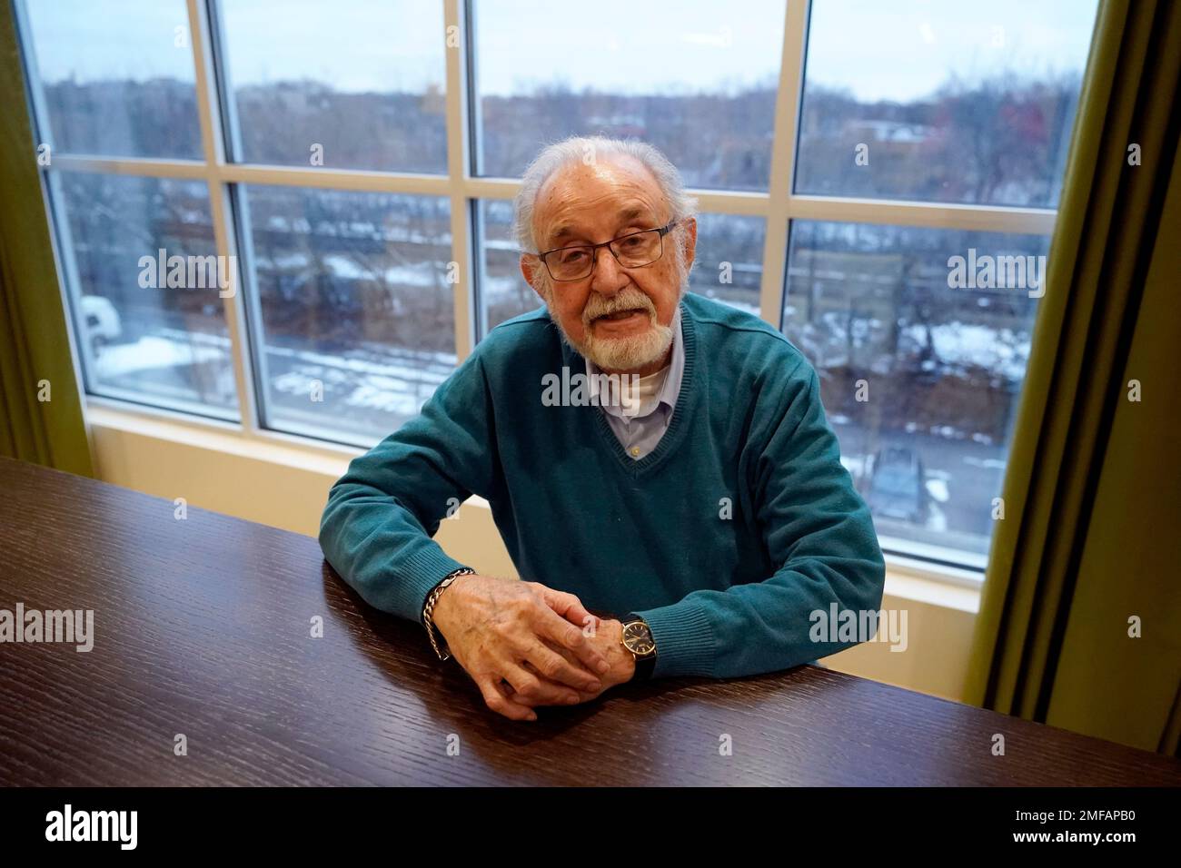 Aaron Jaffe poses for a photo at his apartment lounge in Evanston, Ill ...