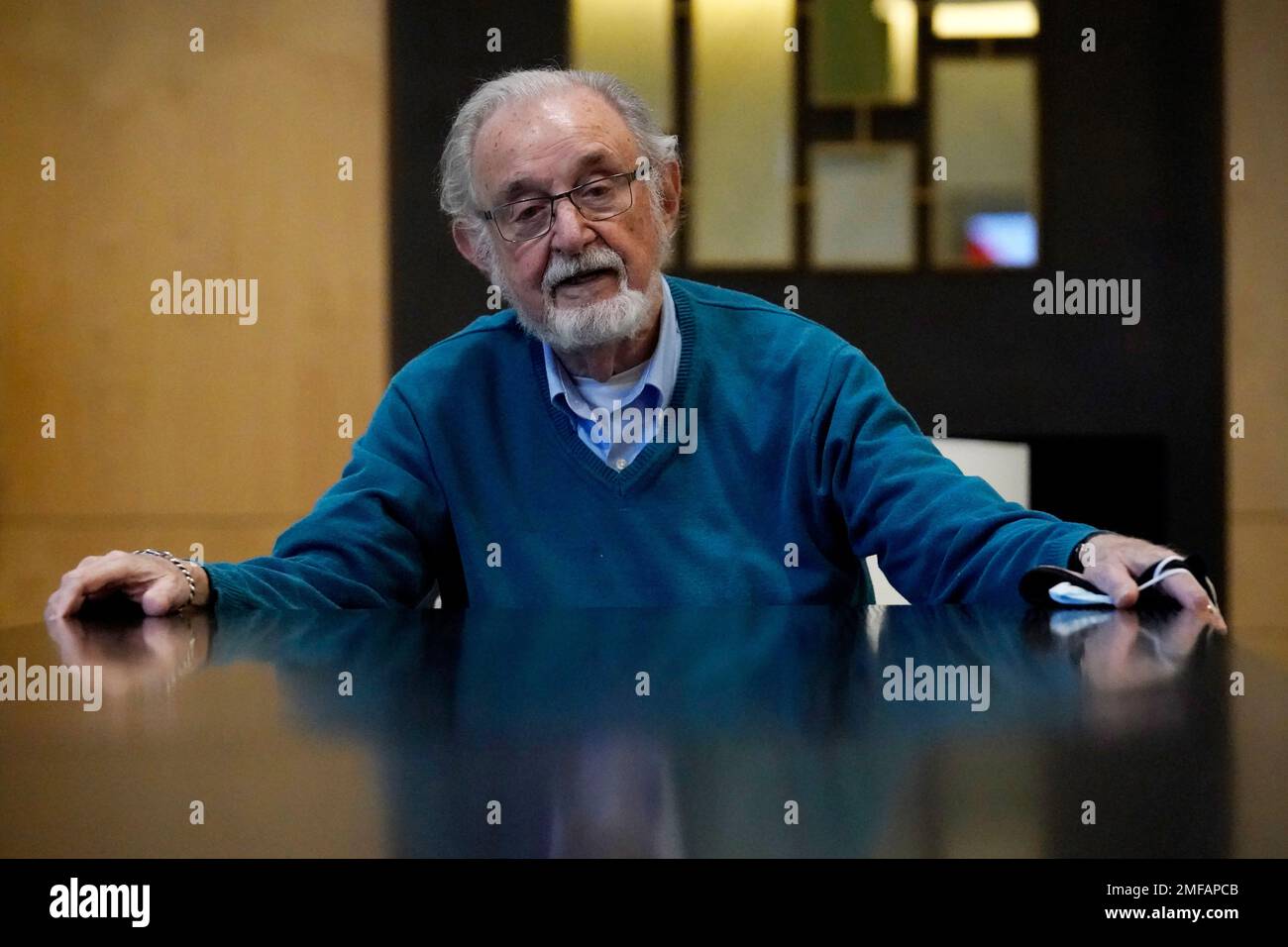 Aaron Jaffe poses for a photo at his apartment lounge in Evanston, Ill ...