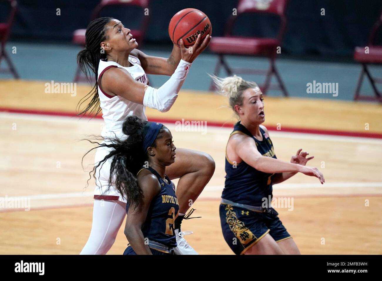 Boston College forward Taylor Soule (13) goes to the basket against