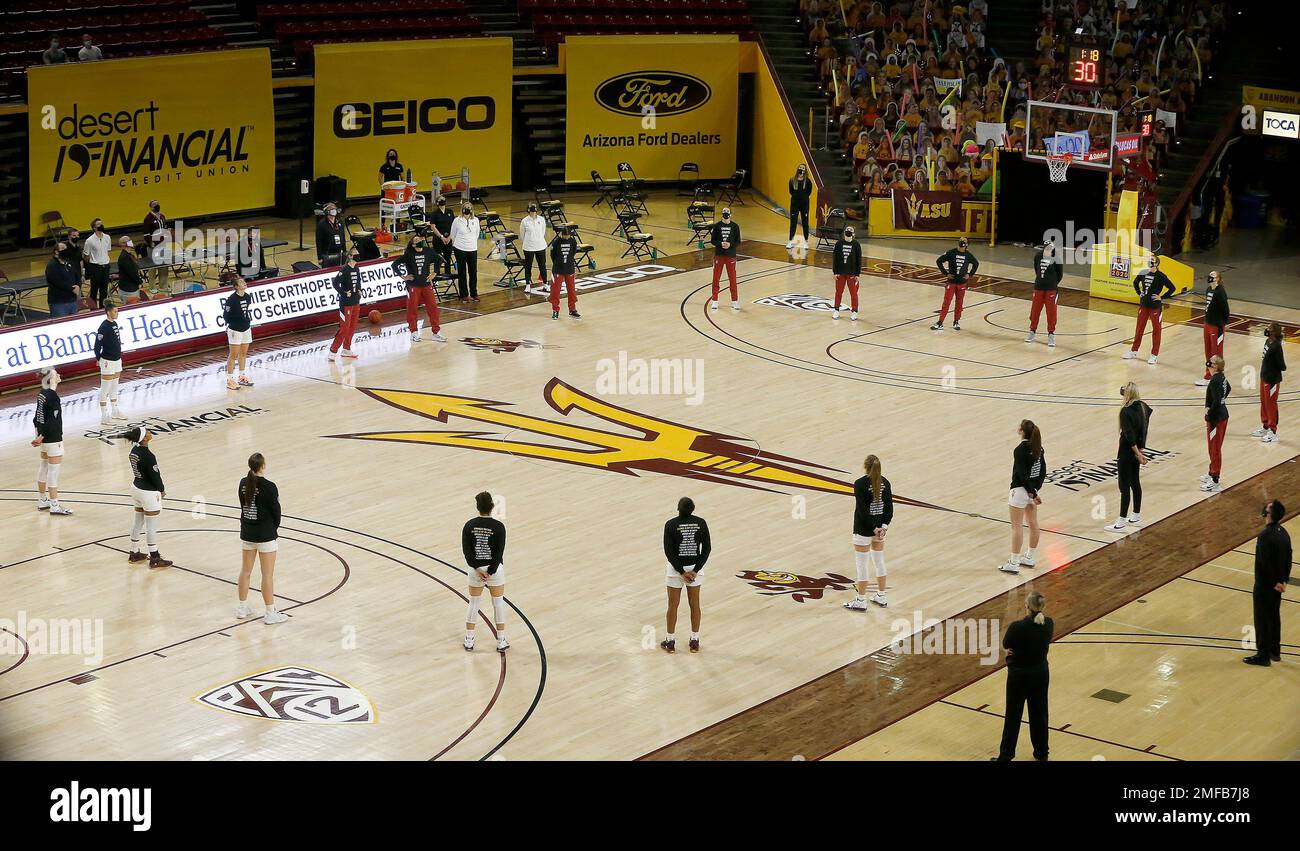 Stanford and Arizona State women's basketball team stand in unity
