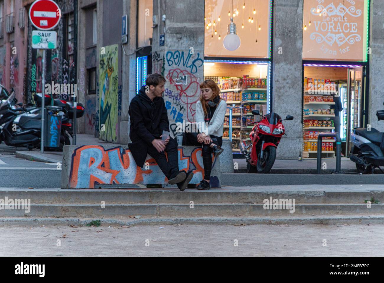 Couple having a serious conversation in Lyon, France Stock Photo