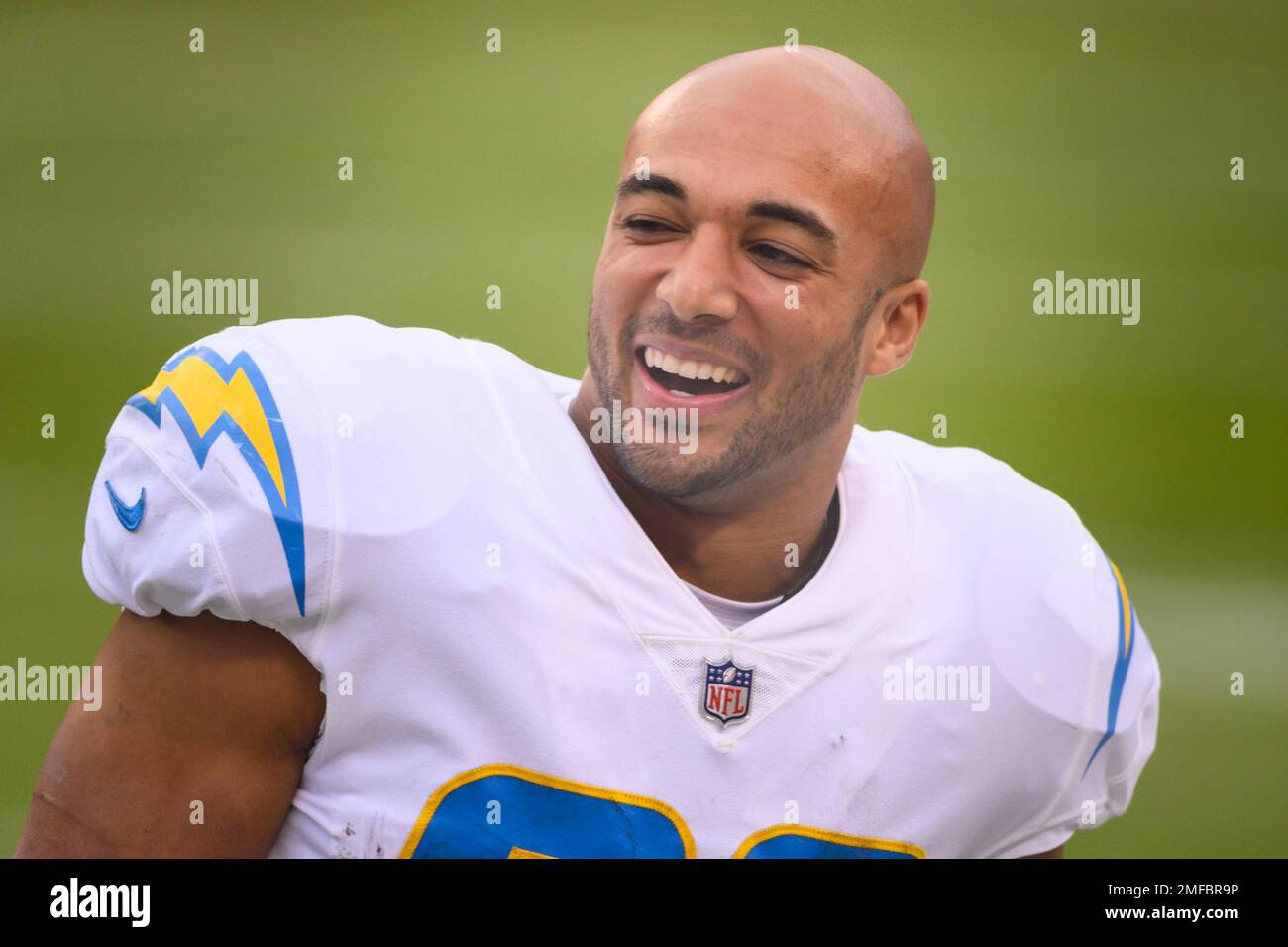 Los Angeles Chargers running back Austin Ekeler (30) laughs with