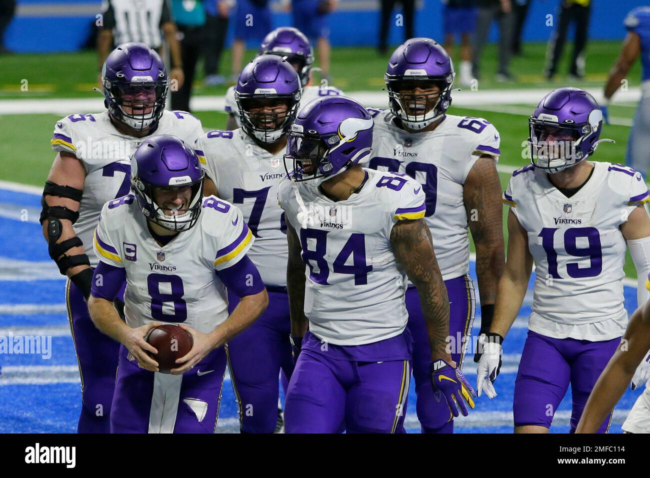Minnesota Vikings quarterback Kirk Cousins (8) and teammates react