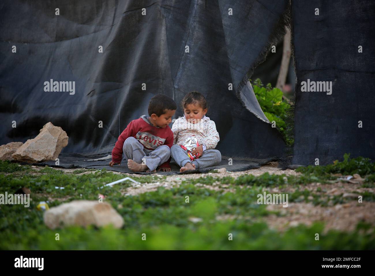 Jerusalem, Israel. 23rd Jan, 2023. Children seen playing in the village of Khan al-Ahmar. Residents of the village of Khan al-Ahmar are at risk of forced eviction, following a visit by members of Netanyahu's Likud party as the Israeli government prepares to implement the decision to demolish the Bedouin village of Khan al-Ahmar in the countryside. (Photo by Saeed Qaq/SOPA Images/Sipa USA) Credit: Sipa USA/Alamy Live News Stock Photo