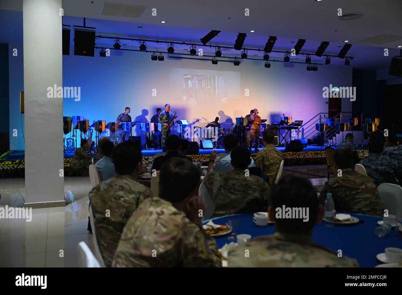U.S. Air Force and Royal Malaysian Air Force personnel watch as USAF