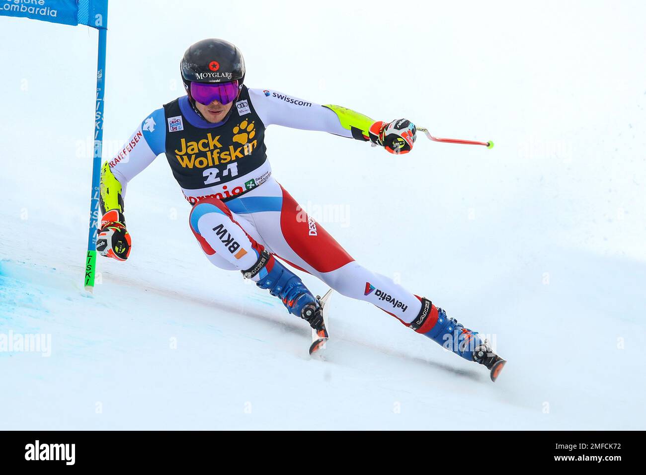 Switzerland's Gino Caviezel speeds down the course during an alpine ski