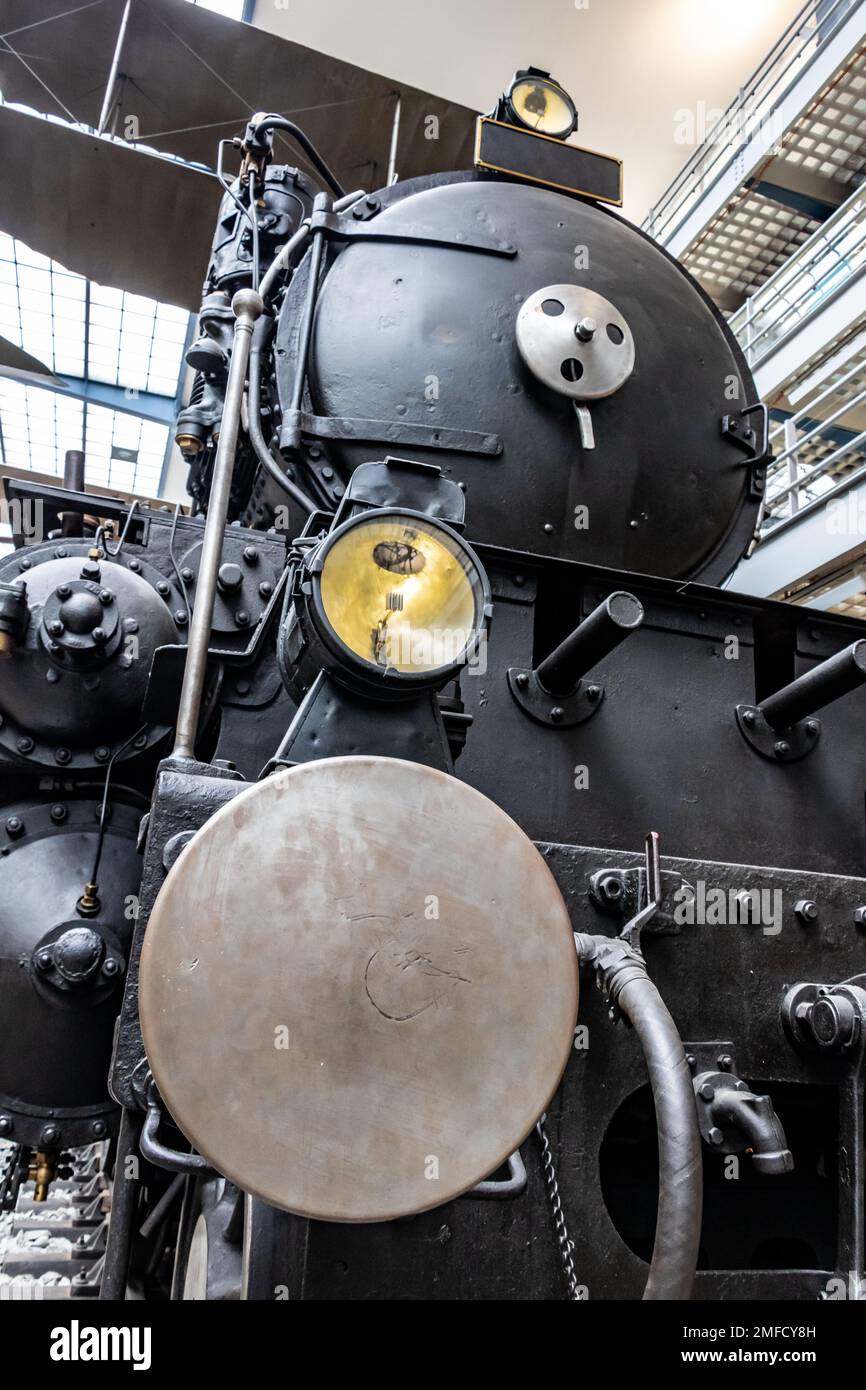 A historical steam locomotive close up, front view Stock Photo
