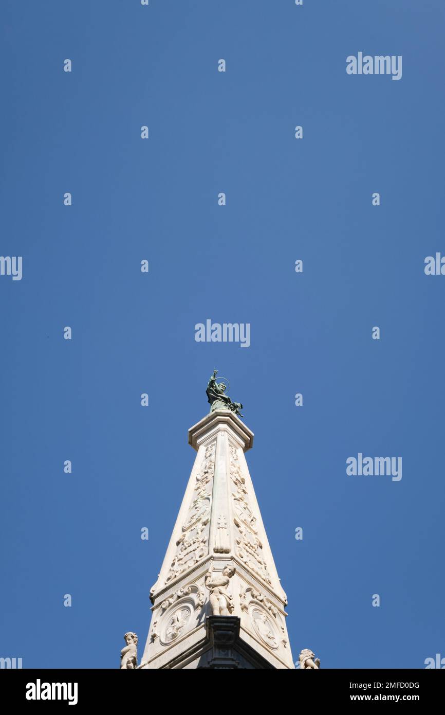 Looking up at the Obelisco di San Domenico in the Centro Historico neighborhood. In Naples, Napoli, Italy, Italia. Stock Photo
