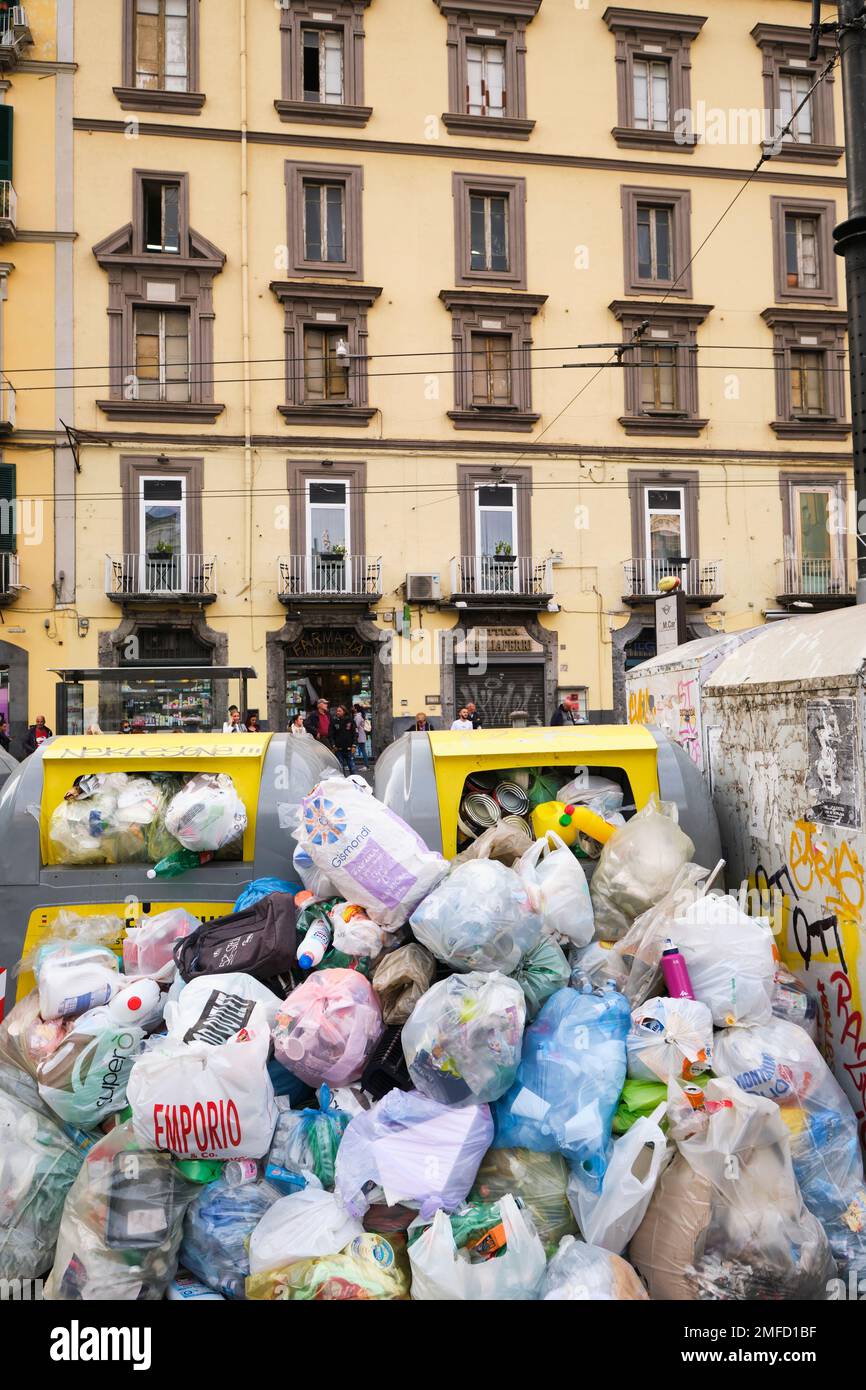 Trash, garbage, refuse, bags next to dumpters piled up, waiting for sanitation collection. Trash, garbage piles are a big environmental problem in the Stock Photo
