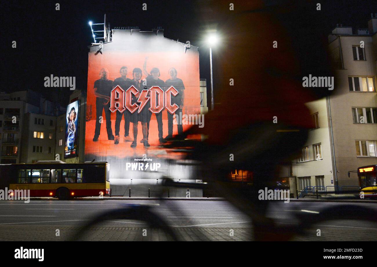 A mural of Australian rock band AC/DC adorns the a house in Warsaw ...