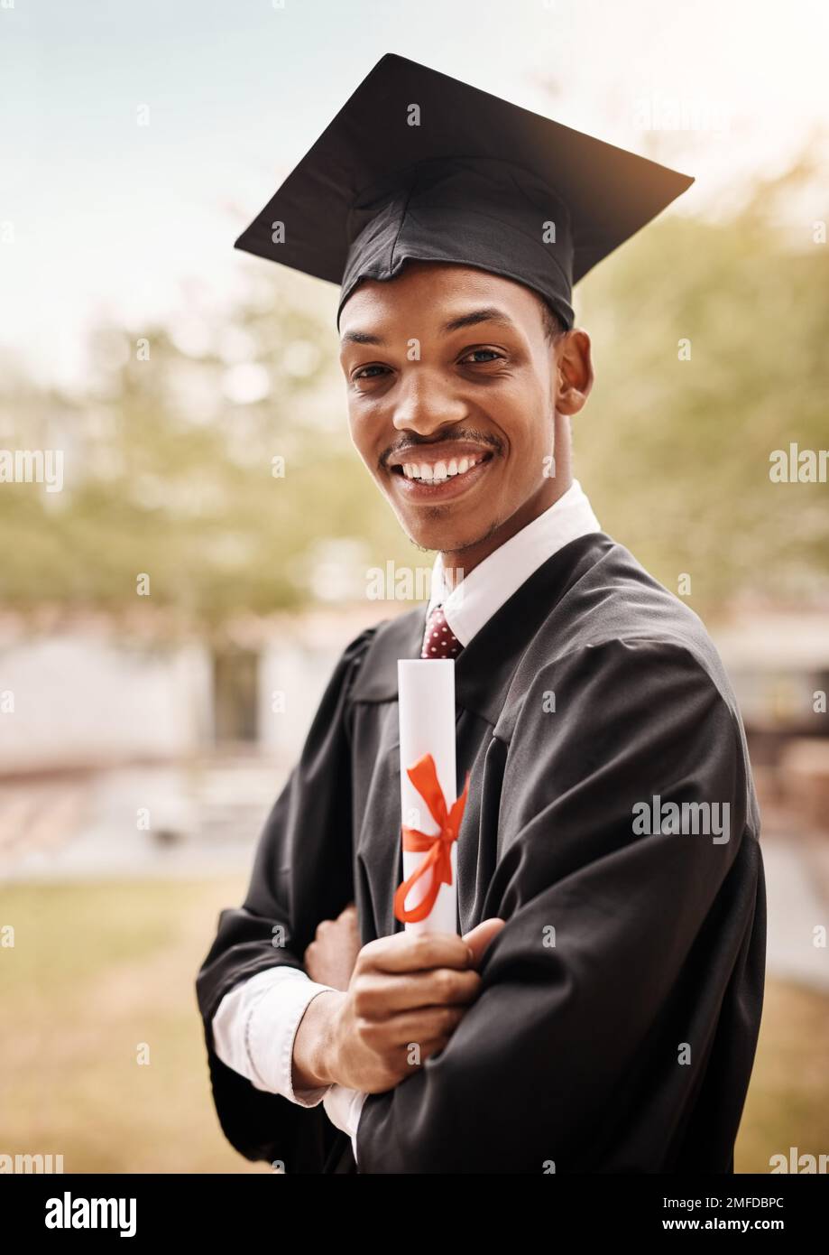 I studied hard to get here today. Portrait of a male student on graduation day from university. Stock Photo