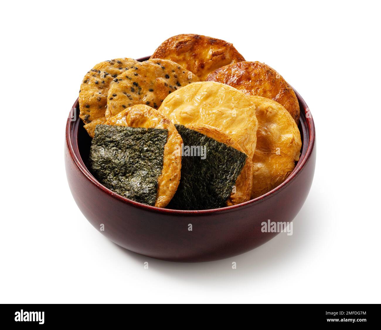 Sembei rice crackers placed on a white background. Senbei is a Japanese snack. Stock Photo