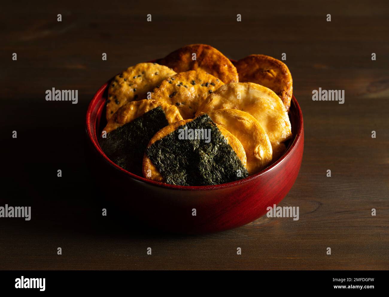 Sembei on the table. Sembei is a Japanese snack. Japanese image photo. Stock Photo