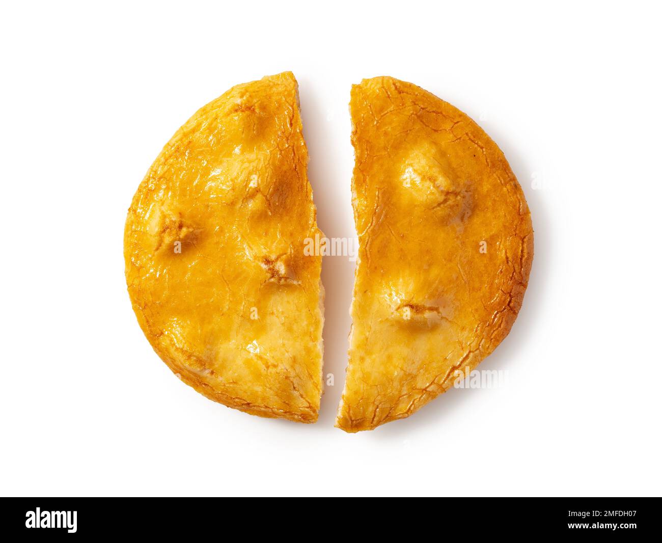 Cracked rice crackers placed on a white background. Sembe is a Japanese snack. A view from above. Stock Photo