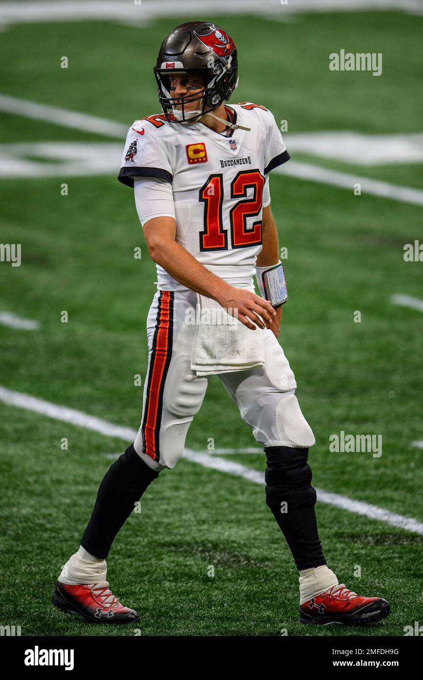 Tampa Bay Buccaneers quarterback Tom Brady (12) walks off the field
