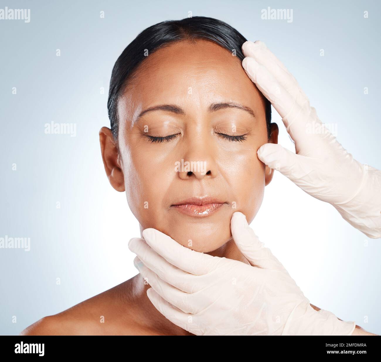 Botox, plastic surgery and hands check woman face for laser, cosmetics