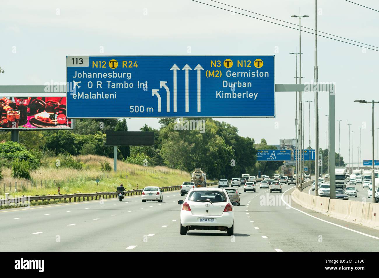 Johannesburg Gauteng South Africa blue road sign above a national road