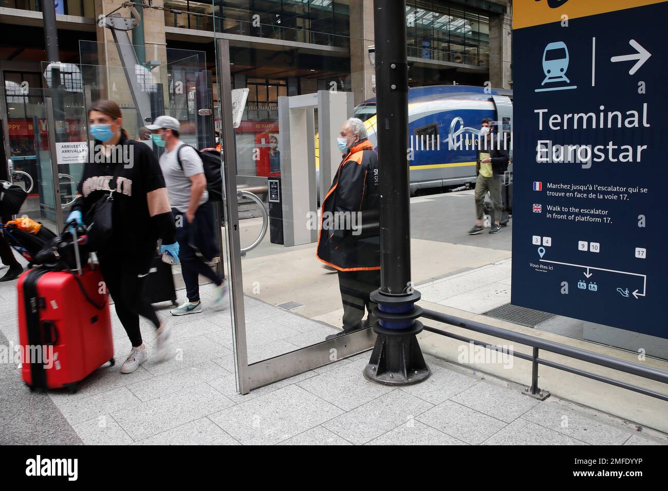 In this May 4, 2020 file photo, Eurostar travelers wearing face masks