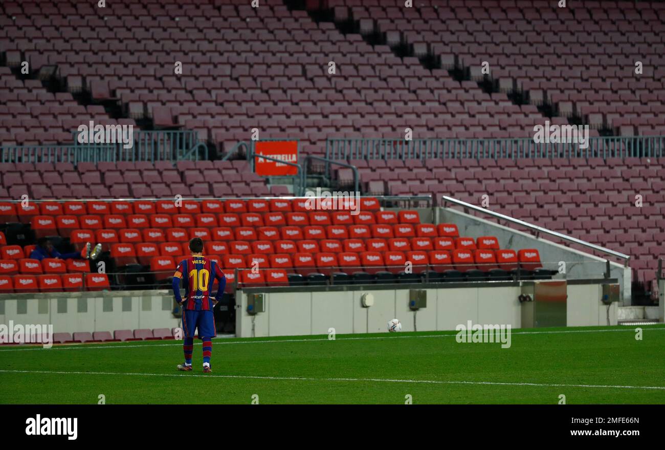 Barcelona's Lionel Messi walks back to his position during the Spanish