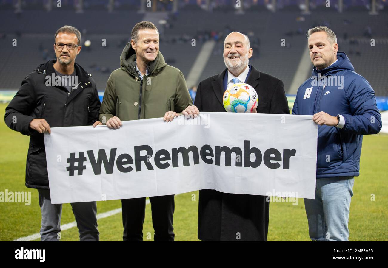 24 January 2023, Berlin: Berlin, 24.01.2023, Soccer, Bundesliga, Matchday 17, Hertha BSC - VfL Wolfsburg, Olympiastadion. Fredi Bobic (l), managing director of Hertha BSC, and Hertha's president Kay Bernstein (r) with a banner with the words: #WeRemember on the occasion of the international Holocaust memorial day. DFL regulations and DFB regulations prohibit any use of photographs as image sequences and/or quasi-video, Photo: Andreas Gora Photo: Andreas Gora/dpa - IMPORTANT NOTE: In accordance with the requirements of the DFL Deutsche Fußball Liga and the DFB Deutscher Fußball-Bund, it is proh Stock Photo