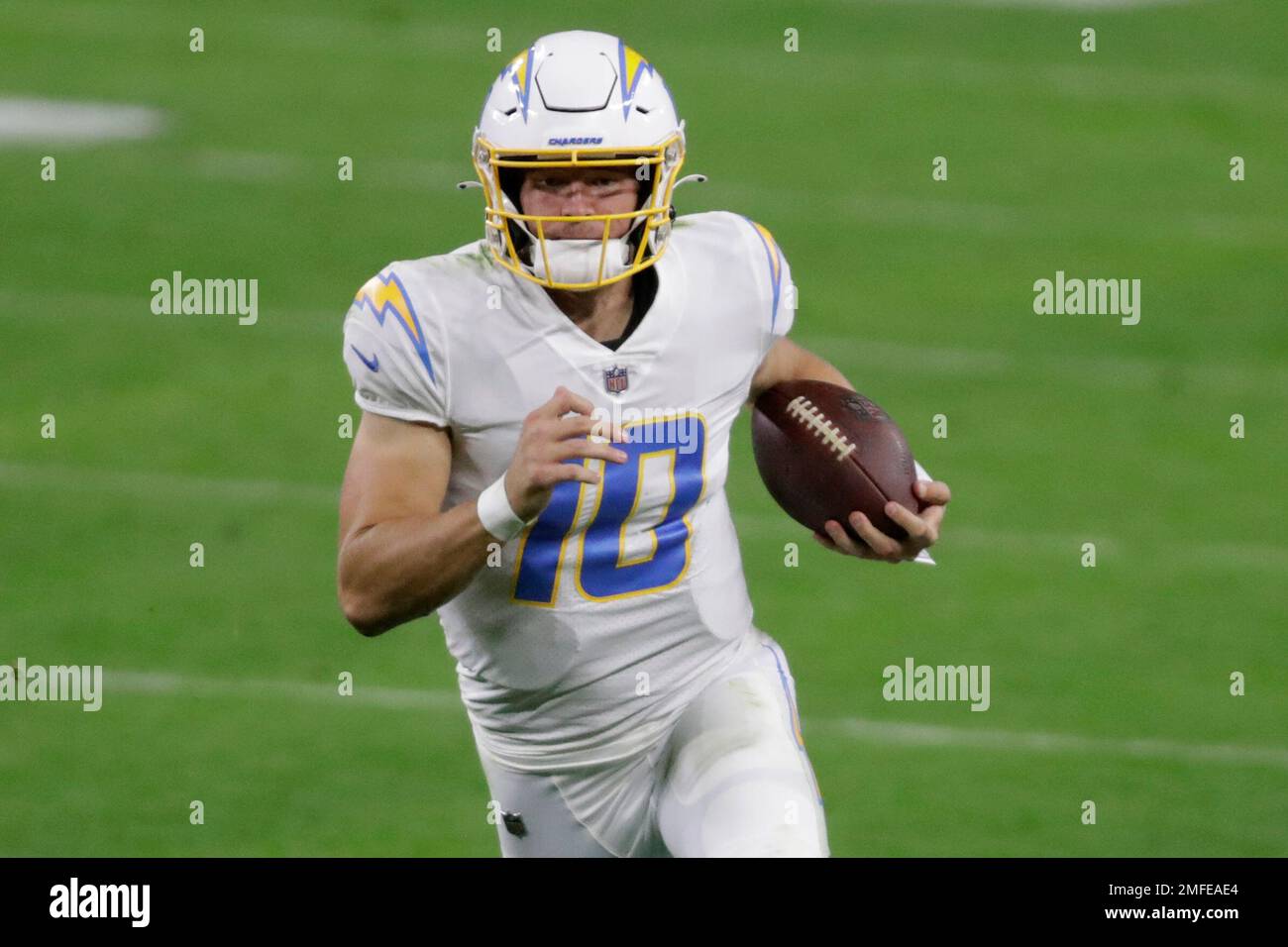 Los Angeles Chargers quarterback Justin Herbert (10) runs against the ...