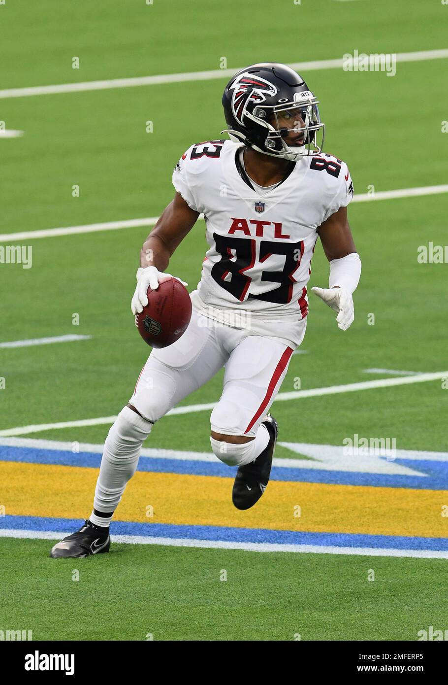 Atlanta Falcons wide receiver Russell Gage (83) scrambles with the ball