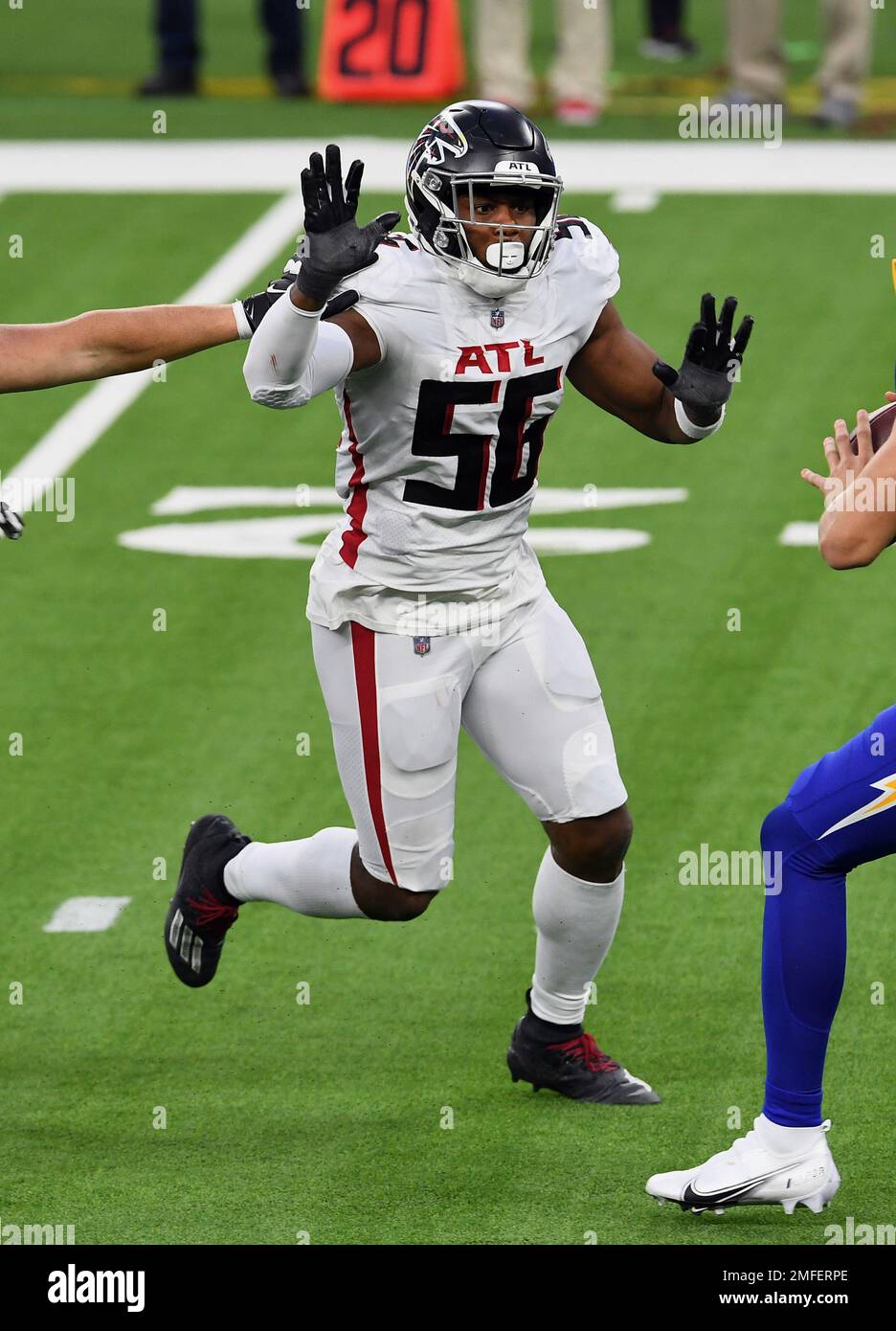 Atlanta Falcons defensive end Dante Fowler Jr. (56) chase after Los
