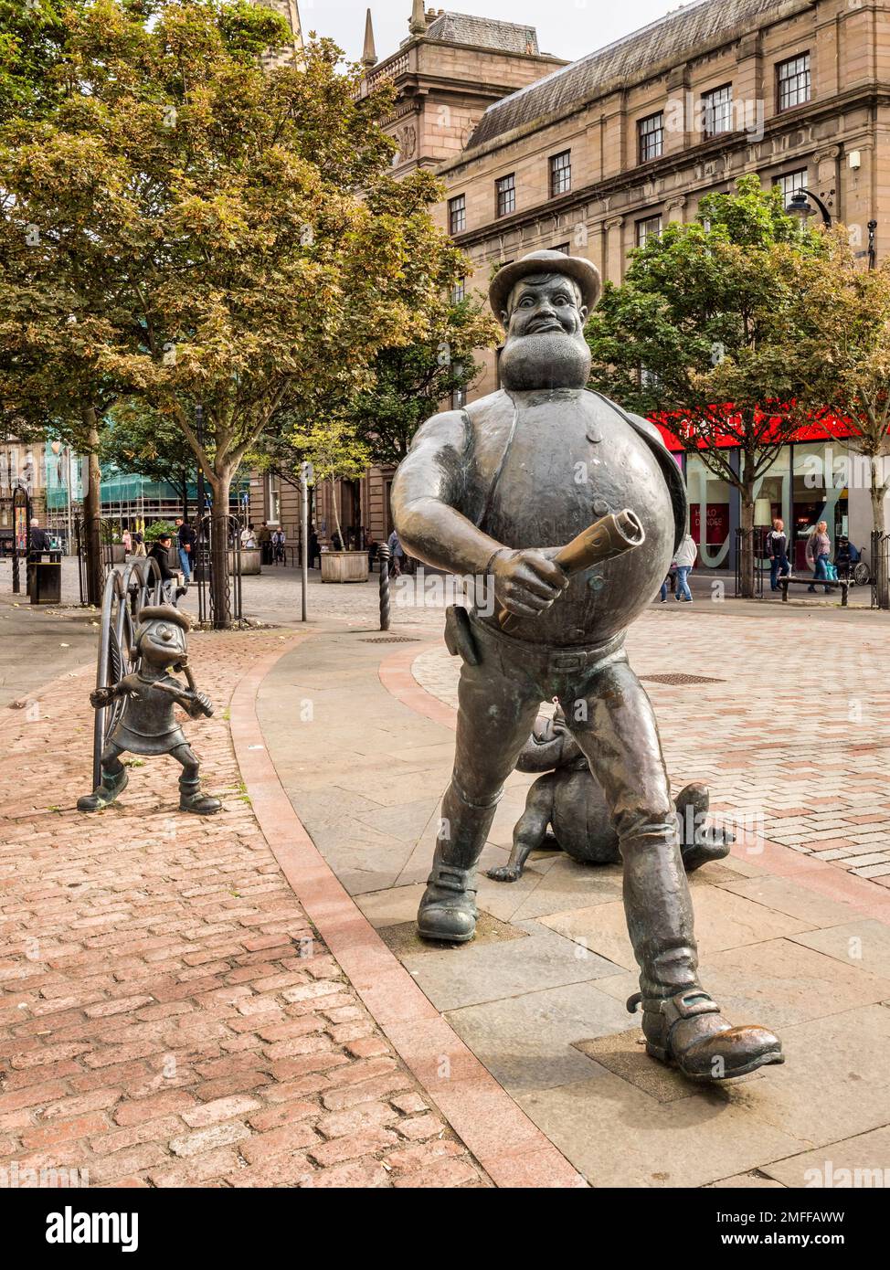 17 September 2022: Dundee, Dundee City, Scotland, UK - Statues of comic characters Desperate Dan and Minnie the Minx in Dundee city centre. Stock Photo