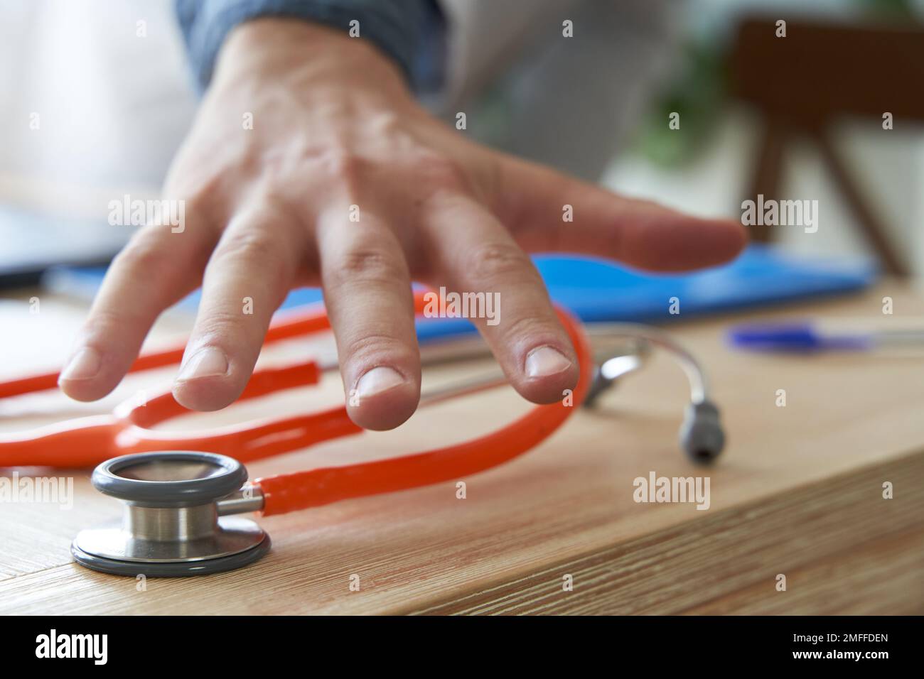 Sudden medical emergency concept. Doctor's hand running to grab