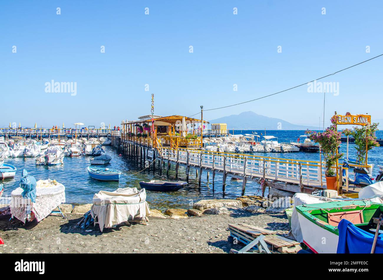 Sorrento Italy August 1 2013   small marina with boats and Vesuvius in the background Stock Photo