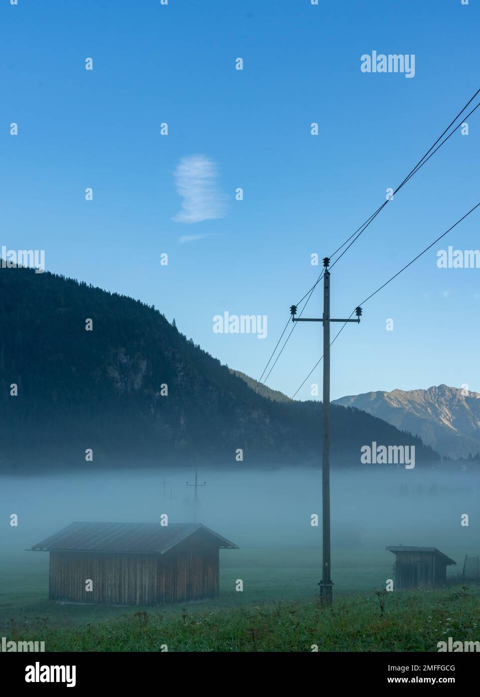 Morning Fog On Wetterstein Mountain, Ehrwald, Tirol, Austria Stock Photo